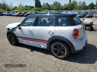 2015 MINI Countryman John Cooper Works with VIN WMWXD1C58FWS34860, listed as a Copart auction lot 55384065 with 48,709 mi miles and Salvage Title. Bid and sale history available at DreamBid. Image 2.