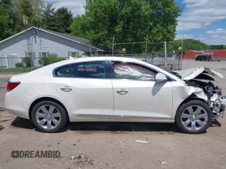 2012 Buick LaCrosse Premium 1 z VIN 1G4GD5E34CF130301, wystawiony jako IAAI lot #42205574 z przebiegiem 117 941 mil mil oraz . Historia ofert i sprzedaży dostępna na DreamBid. Obrazek 14.