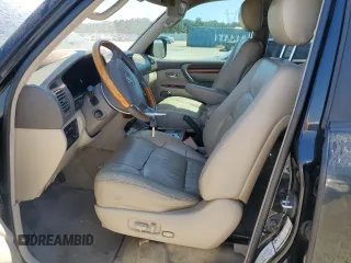 2004 Lexus LX 470 z VIN JTJHT00W843539918, wystawiony jako Copart lot #60612045 z przebiegiem 303 070 mil mil oraz Czysty tytuł • Clean title. Historia ofert i sprzedaży dostępna na DreamBid. Obrazek 7.