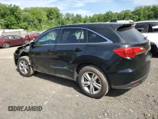 2013 Acura RDX with VIN 5J8TB4H31DL024097, listed as a Copart auction lot 57666335 with 125,038 mi miles and Salvage title. Bid and sale history available at DreamBid. Image 2.