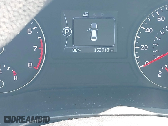 2016 Kia Optima LX with VIN 5XXGT4L33GG111427, listed as a IAAI auction lot 42801281 with 163,013 mi miles and . Bid and sale history available at DreamBid. Image 7.
