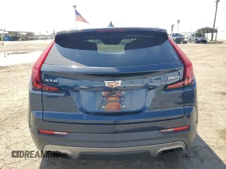 2019 Cadillac XT4 FWD Premium Luxury with VIN 1GYFZCR42KF104457, listed as a Copart auction lot 52783485 with 57,572 mi miles and Salvage title. Bid and sale history available at DreamBid. Image 6.