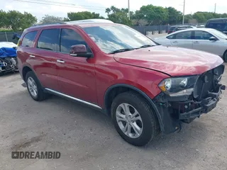 2013 Dodge Durango Crew z VIN 1C4RDJDG5DC678112, wystawiony jako IAAI lot #41584846 z przebiegiem 145 223 mil mil oraz . Historia ofert i sprzedaży dostępna na DreamBid. Obrazek 1.