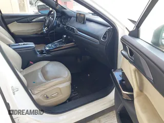 2016 Mazda CX-9 Grand Touring with VIN JM3TCADYXG0113563, listed as a IAAI auction lot 42593120 with 237,696 mi miles and . Bid and sale history available at DreamBid. Image 5.