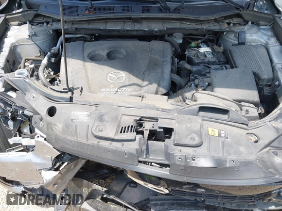 2014 Mazda CX-5 Sport with VIN JM3KE2BEXE0329303, listed as a IAAI auction lot 42556908 with 127,836 mi miles and . Bid and sale history available at DreamBid. Image 10.