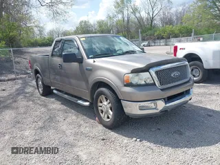 2004 Ford F-150 XL with VIN 1FTPX12584NA58780, listed as a IAAI auction lot 42123687 with 160,672 mi miles. Bid and sale history available at carsss.com. Image 1.