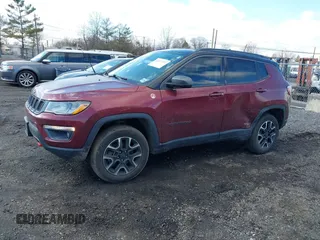 2020 Jeep Compass Trailhawk with VIN 3C4NJDDB2LT239384, listed as a IAAI auction lot 41527372 with 56,122 mi miles and . Bid and sale history available at carsss.com. Image 2.