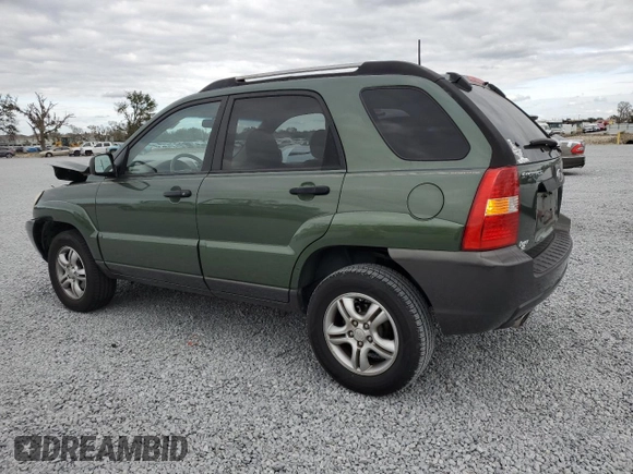 2005 Kia Sportage LX with VIN KNDJF723657074234, listed as a Copart auction lot 86792794 with 97,548 mi miles and Salvage Title. Bid and sale history available at carsss.com. Image 2.