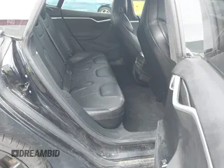 2016 Tesla Model S 90D z VIN 5YJSA1E4XGF171681, wystawiony jako IAAI lot #41836005 z przebiegiem 81 063 mil mil oraz . Historia ofert i sprzedaży dostępna na DreamBid. Obrazek 8.