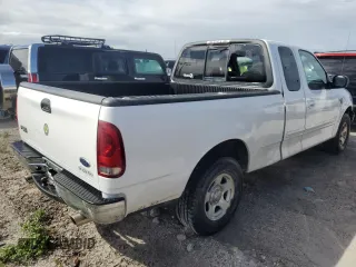2003 Ford F-150 XL with VIN 1FTRX17L53NB90331, listed as a Copart auction lot 76686124 with 0 mi miles and Salvage Title. Bid and sale history available at carsss.com. Image 3.