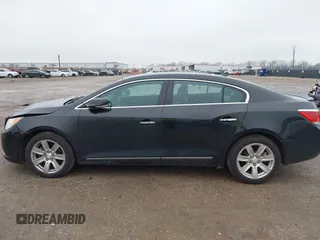 2013 Buick LaCrosse Premium 1 z VIN 1G4GF5E37DF174904, wystawiony jako IAAI lot #41544879 z przebiegiem 157 979 mil mil oraz . Historia ofert i sprzedaży dostępna na DreamBid. Obrazek 14.