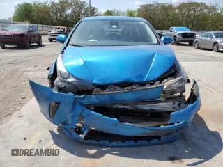 2020 Toyota Prius L Eco z VIN JTDKARFU3L3125646, wystawiony jako Copart lot #52942245 z przebiegiem 104 999 mil mil oraz Szkoda całkowita • Salvage title. Historia ofert i sprzedaży dostępna na DreamBid. Obrazek 5.