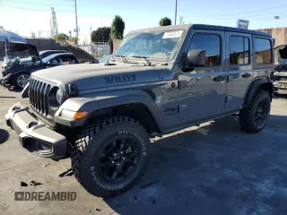 2020 Jeep Wrangler Unlimited Willys with VIN 1C4HJXDG5LW348507, listed as a Copart auction lot 77000574 with 57,056 mi miles and Salvage title. Bid and sale history available at DreamBid. Image 1.