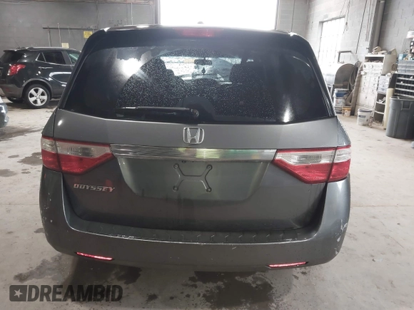 2012 Honda Odyssey EX-L with VIN 5FNRL5H63CB137198, listed as a IAAI auction lot 42706690 with 305,753 mi miles and . Bid and sale history available at DreamBid. Image 16.