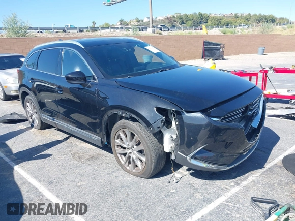 2017 Mazda CX-9 Grand Touring with VIN JM3TCBDY0H0130671, listed as a IAAI auction lot 42514237 with 81,016 mi miles and . Bid and sale history available at DreamBid. Image 1.
