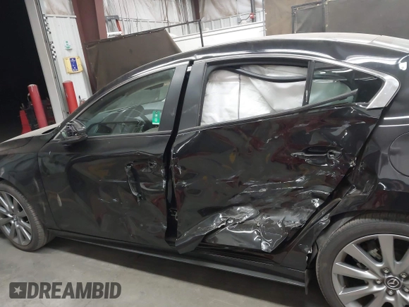 2023 Mazda 3 S Preferred with VIN 3MZBPACM5PM369790, listed as a IAAI auction lot 41612983 with 9,789 mi miles and . Bid and sale history available at DreamBid. Image 14.