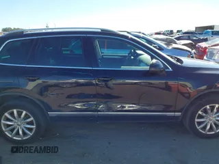 2016 Volkswagen Touareg Sport with VIN WVGEF9BP4GD012265, listed as a IAAI auction lot 41208383 with 69,205 mi miles and . Bid and sale history available at DreamBid. Image 13.