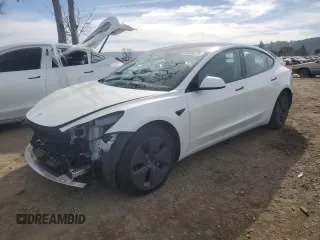 2023 Tesla Model 3 with VIN 5YJ3E1EA9PF546149, listed as a Copart auction lot 52104365 with 34,105 mi miles and Salvage Title. Bid and sale history available at DreamBid. Image 1.