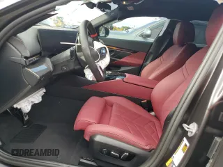 2024 BMW i5 M60 with VIN WBY43FK00RCR71826, listed as a Copart auction lot 72140144 with 5,987 mi miles and Salvage Title. Bid and sale history available at carsss.com. Image 7.