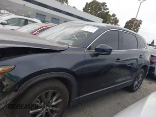 2021 Mazda CX-9 Touring with VIN JM3TCACY9M0526880, listed as a IAAI auction lot 42310923 with 25,991 mi miles and . Bid and sale history available at DreamBid. Image 15.