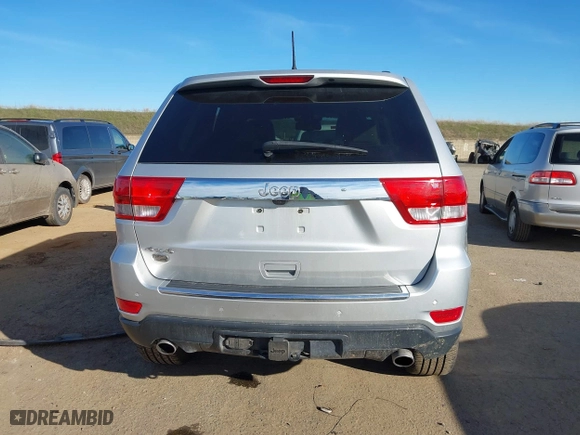 2012 Jeep Grand Cherokee Overland with VIN 1C4RJFCTXCC201422, listed as a IAAI auction lot 41283376 with 93,736 mi miles. Bid and sale history available at carsss.com. Image 16.