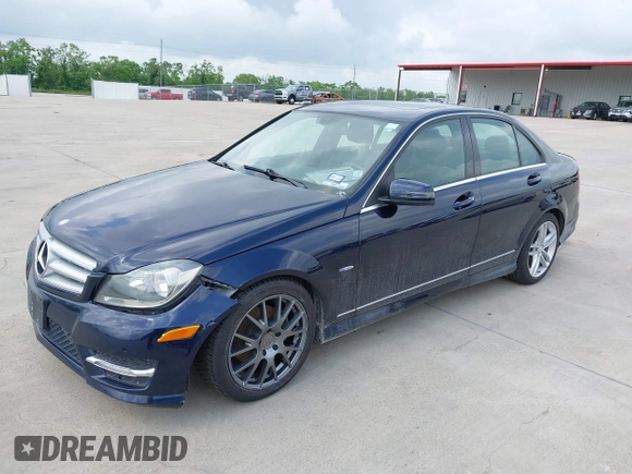 2012 Mercedes-Benz C-Class C 250 Sport with VIN WDDGF4HB1CA599859, listed as a IAAI auction lot 42120154 with 74,151 mi miles. Bid and sale history available at carsss.com. Image 2.