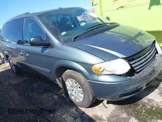 2007 Chrysler Town & Country LWB LX with VIN 2A4GP44R97R351932, listed as a IAAI auction lot 41693734 with 244,286 mi miles. Bid and sale history available at carsss.com. Image 1.