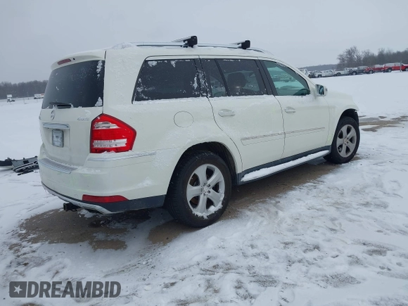 2012 Mercedes-Benz GL-Class GL 450 with VIN 4JGBF7BE1CA778228, listed as a IAAI auction lot 41600173 with 115,605 mi miles. Bid and sale history available at carsss.com. Image 4.