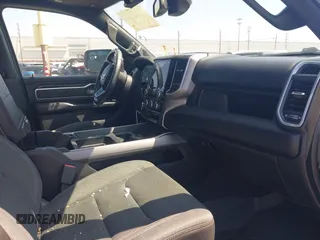 2019 Ram 1500 Big Horn z VIN 1C6RRFFG8KN710927, wystawiony jako IAAI lot #41850421 z przebiegiem 66 007 mil mil oraz . Historia ofert i sprzedaży dostępna na DreamBid. Obrazek 5.
