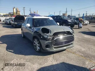 2016 MINI Hardtop 4 Door with VIN WMWXU1C59G2D11117, listed as a Copart auction lot 65191715 with 121,633 mi miles and Salvage title. Bid and sale history available at DreamBid. Image 13.