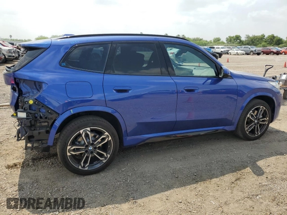 2024 BMW X1 xDrive28i with VIN WBX73EF06R5007063, listed as a Copart auction lot 56143075 with 2,947 mi miles and Salvage title. Bid and sale history available at DreamBid. Image 3.