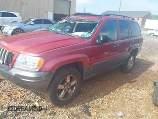 2004 Jeep Grand Cherokee Laredo with VIN 1J4GW48S34C419596, listed as a IAAI auction lot 42515494 with 276,196 mi miles and . Bid and sale history available at DreamBid. Image 18.
