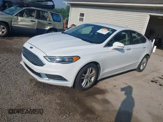 2018 Ford Fusion SE with VIN 3FA6P0HDXJR135927, listed as a IAAI auction lot 42645427 with 107,756 mi miles and . Bid and sale history available at DreamBid. Image 18.