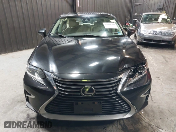 2018 Lexus ES 350 z VIN 58ABK1GG3JU083398, wystawiony jako IAAI lot #42094308 z przebiegiem 98 019 mil mil oraz . Historia ofert i sprzedaży dostępna na DreamBid. Obrazek 12.