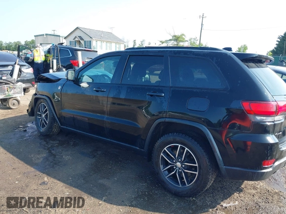 2018 Jeep Grand Cherokee Trailhawk with VIN 1C4RJFLG4JC241057, listed as a IAAI auction lot 42416590 with 81,822 mi miles and . Bid and sale history available at DreamBid. Image 3.