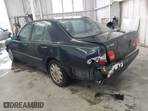 1997 Mercedes-Benz E-Class with VIN WDBJF55F8VA415421, listed as a IAAI auction lot 41536015 with 237,345 mi miles. Bid and sale history available at carsss.com. Image 3.