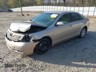 2007 Toyota Camry CE with VIN 4T1BE46K57U601350, listed as a IAAI auction lot 41889044 with 197,738 mi miles. Bid and sale history available at carsss.com. Image 2.