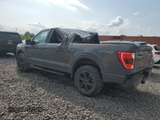2021 Ford F-150 XL with VIN 1FTFW1E8XMFC22903, listed as a Copart auction lot 57840855 with 66,127 mi miles and Salvage title. Bid and sale history available at DreamBid. Image 2.