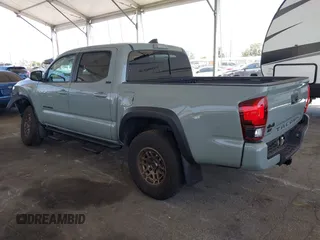 2022 Toyota Tacoma SR with VIN 3TMCZ5ANXNM479025, listed as a IAAI auction lot 42280363 with 29,650 mi miles and . Bid and sale history available at DreamBid. Image 3.