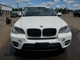 2012 BMW X5 35i with VIN 5UXZV4C54CL763857, listed as a Copart auction lot 57943195 with 143,522 mi miles and Salvage title. Bid and sale history available at DreamBid. Image 5.