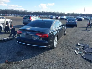 2015 Audi A8 L 4.0T with VIN WAU32AFD4FN014063, listed as a IAAI auction lot 41501970 with 158,570 mi miles. Bid and sale history available at carsss.com. Image 4.