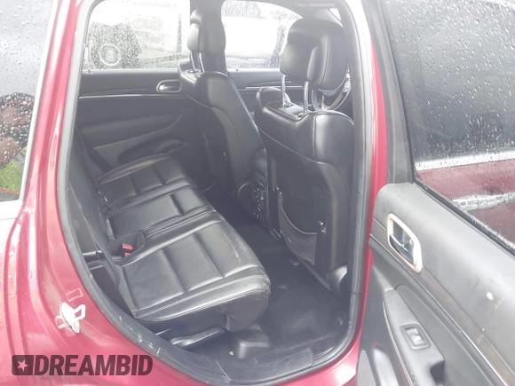 2014 Jeep Grand Cherokee Overland with VIN 1C4RJFCG9EC460165, listed as a IAAI auction lot 42092137 with 131,802 mi miles and . Bid and sale history available at DreamBid. Image 8.