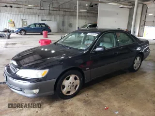 2000 Lexus ES 300 with VIN JT8BF28G9Y5096910, listed as a Copart auction lot 64703365 with 82,386 mi miles and Salvage title. Bid and sale history available at DreamBid. Image 1.