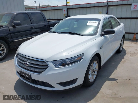 2015 Ford Taurus SE with VIN 1FAHP2D8XFG105029, listed as a IAAI auction lot 42068632 with 164,098 mi miles and . Bid and sale history available at carsss.com. Image 2.