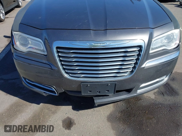 2014 Chrysler 300 with VIN 2C3CCAAG1EH191375, listed as a IAAI auction lot 41867688 with 218,740 mi miles. Bid and sale history available at carsss.com. Image 6.