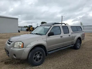 2003 Nissan Frontier XE with VIN 1N6ED29Y83C461767, listed as a Copart auction lot 58077425 with 164,955 mi miles and Salvage title. Bid and sale history available at DreamBid. Image 1.