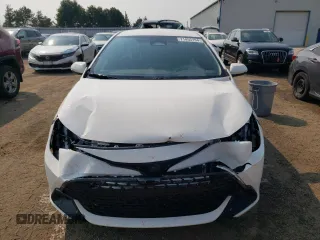 2025 Toyota Corolla Hatchback with VIN JTNK4MBEXS3233751, listed as a Copart auction lot 71455194 with 4,006 mi miles and Salvage Title. Bid and sale history available at carsss.com. Image 5.