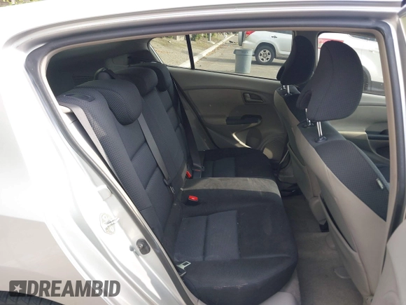 2010 Honda Insight EX with VIN JHMZE2H75AS003695, listed as a IAAI auction lot 42119429 with 90,901 mi miles and . Bid and sale history available at DreamBid. Image 8.