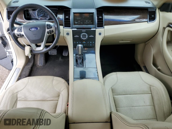 2015 Ford Taurus Limited with VIN 1FAHP2F82FG148180, listed as a Copart auction lot 62354685 with 107,998 mi miles and Salvage title. Bid and sale history available at DreamBid. Image 8.
