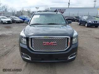 2016 GMC Yukon XL Denali with VIN 1GKS2HKJ8GR139858, listed as a IAAI auction lot 41915183 with 151,830 mi miles. Bid and sale history available at carsss.com. Image 13.